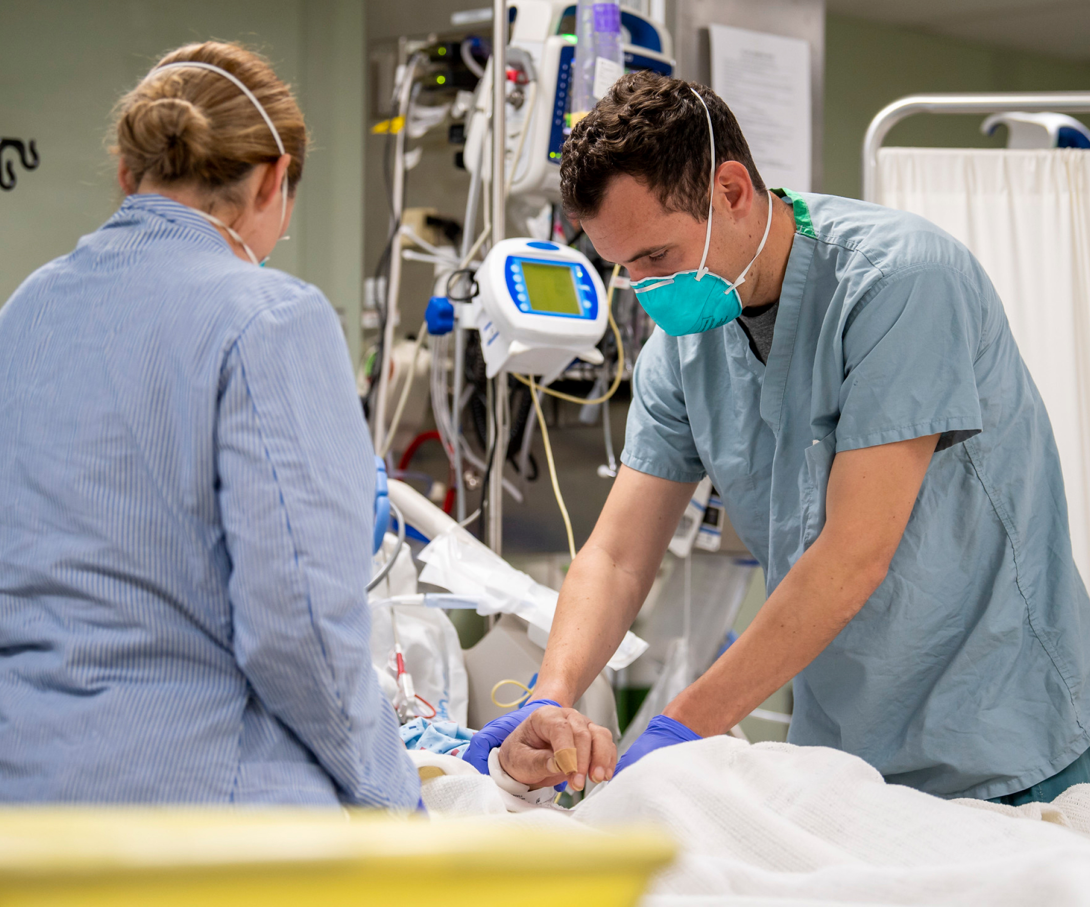 Doctors at Brigham and Women's Hospital treating a patient for COVID-19.