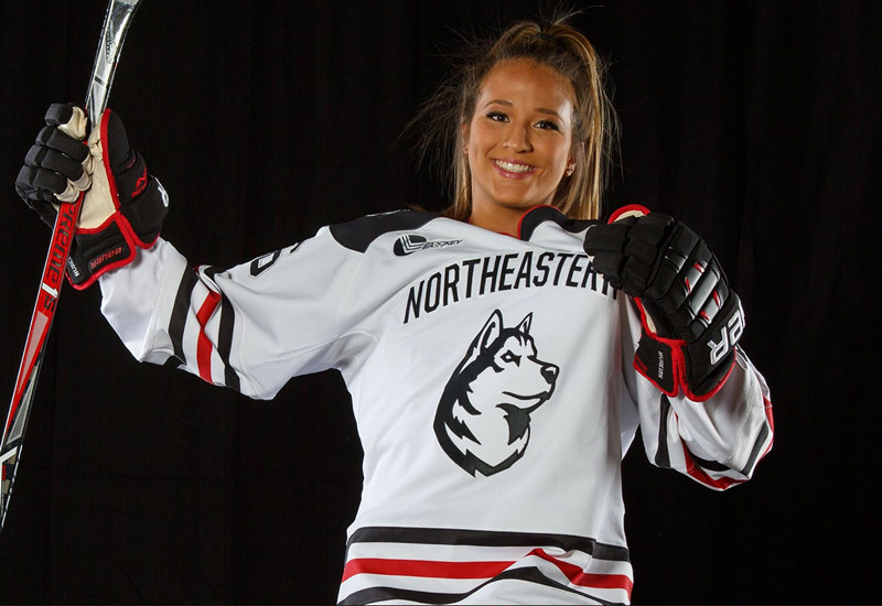 Northeastern hockey player in uniform.