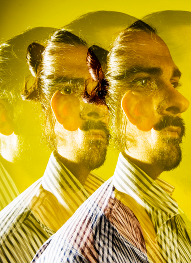 Student portrait on yellow background.