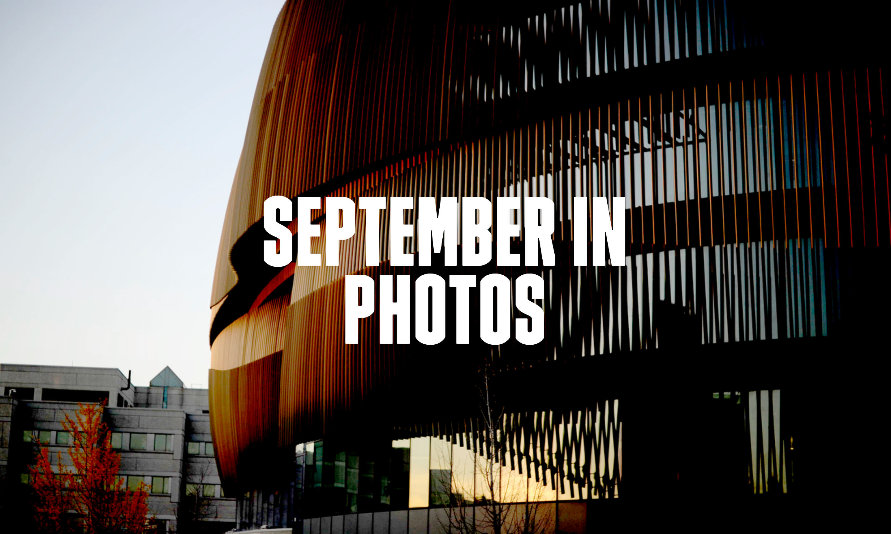 Outside of ISEC building with text that reads: September ion Photos.